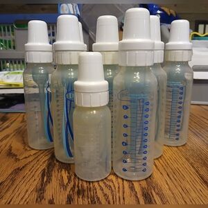 Set of Baby Bottles with White Caps